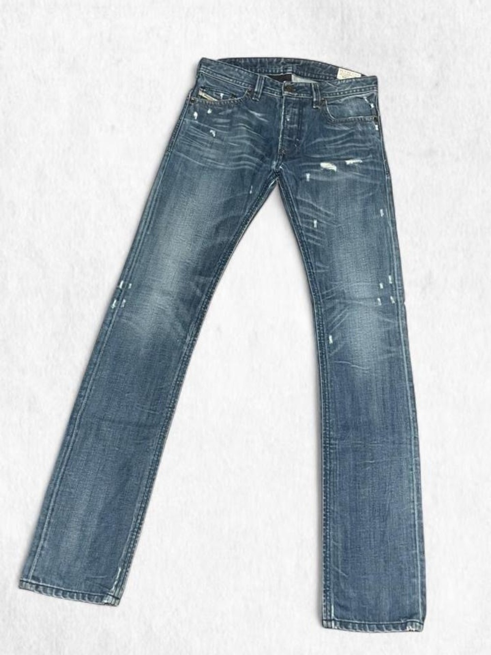 Deadstock DIESEL slim skinny THAVAR 30x34 w/ unique distressing